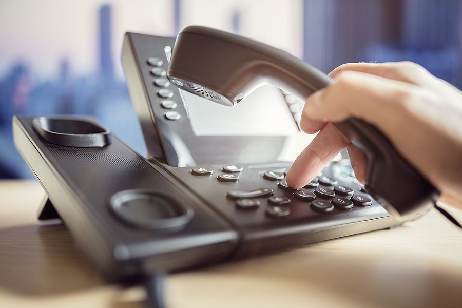 Support desk picking up a call